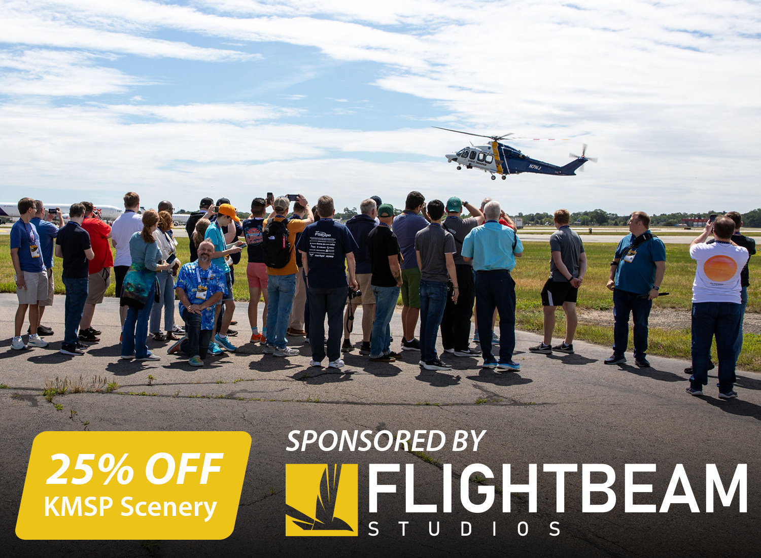Attendees watching aircraft at an airport tour of Providence in 2025.